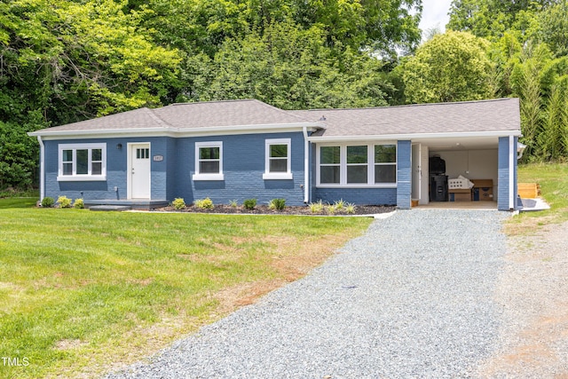1917 Tucker St, Burlington, NC 27215 - single story home featuring driveway, a front yard, roof with shingles, and brick siding