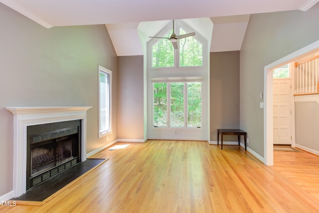 5314 Taproot Ln, Durham, NC 27705 - unfurnished living room featuring a ceiling fan, wood finished floors, baseboards, and vaulted ceiling