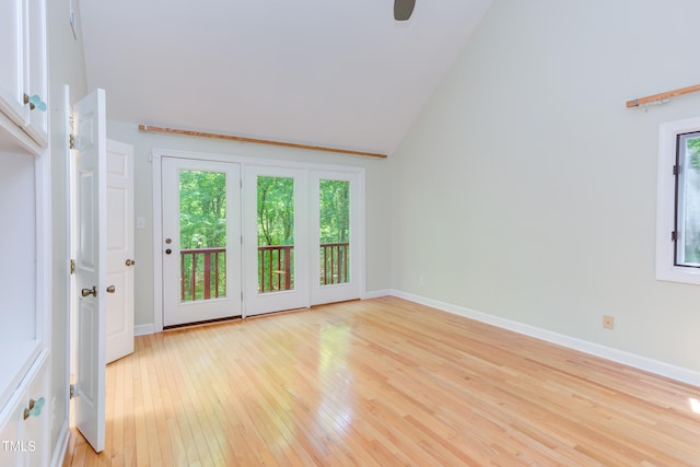 5314 Taproot Ln, Durham, NC 27705 - unfurnished room with light wood-type flooring, vaulted ceiling, and baseboards