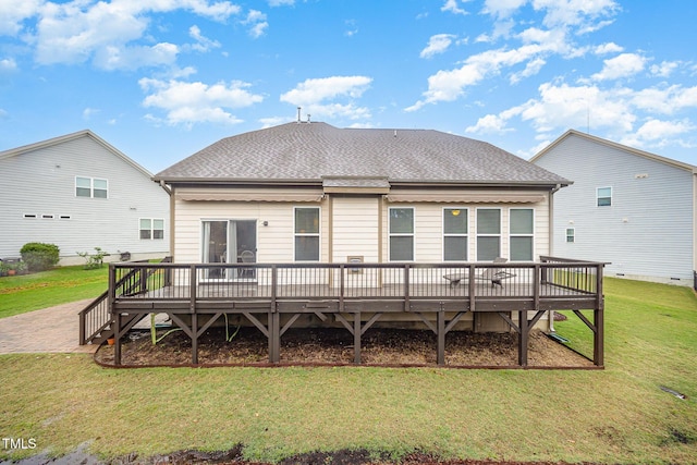1201 Pleasant Falls Ct, Wake Forest, NC 27587 - back of property featuring a wooden deck, a lawn, and roof with shingles