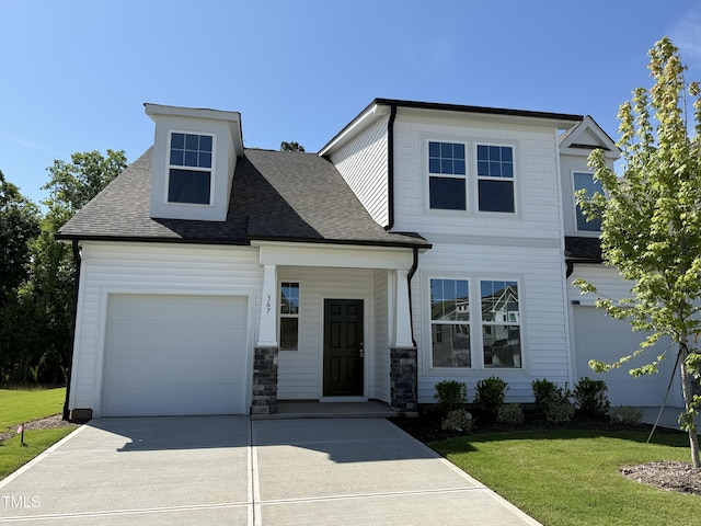367 Whitley Ridge Dr, Clayton, NC 27527 - view of front of house featuring concrete driveway, a front yard, roof with shingles, and an attached garage