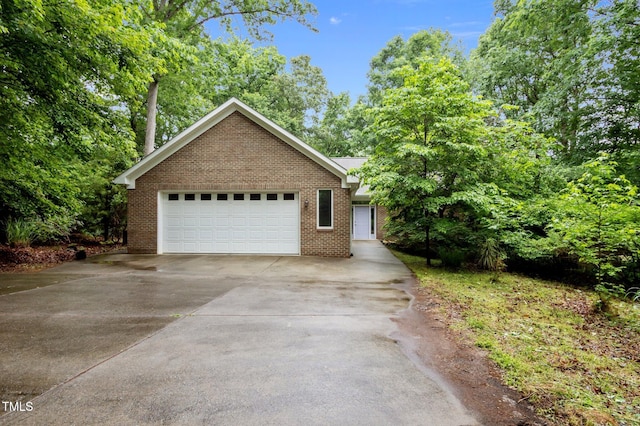 224 Crawford Rd, Hillsborough, NC 27278 - view of front of home with brick siding and concrete driveway