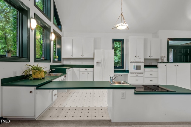 224 Crawford Rd, Hillsborough, NC 27278 - kitchen with white appliances, dark countertops, a sink, and healthy amount of natural light