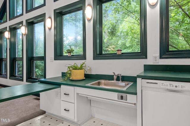 224 Crawford Rd, Hillsborough, NC 27278 - kitchen with dishwasher, dark countertops, white cabinetry, and a sink