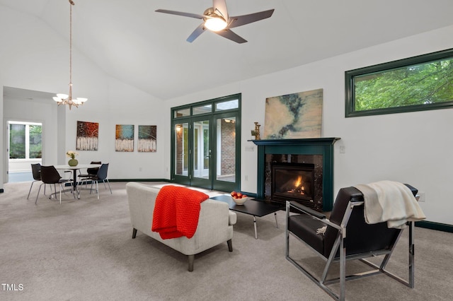 224 Crawford Rd, Hillsborough, NC 27278 - carpeted living area with a chandelier, a premium fireplace, high vaulted ceiling, baseboards, and ceiling fan