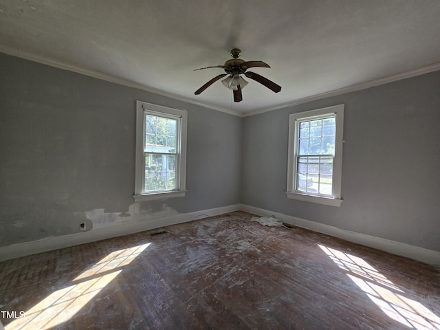 500 Vance St NE, Wilson, NC 27893 - empty room featuring healthy amount of natural light, baseboards, and ornamental molding