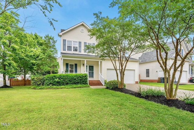 traditional-style home with concrete driveway and covered porch