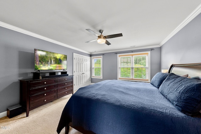bedroom with crown molding, light carpet, baseboards, and ceiling fan