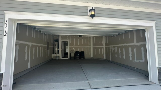 3112 Star Gazing Ln, Durham, NC 27703 - garage with water heater