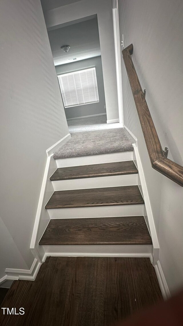3112 Star Gazing Ln, Durham, NC 27703 - stairs with baseboards