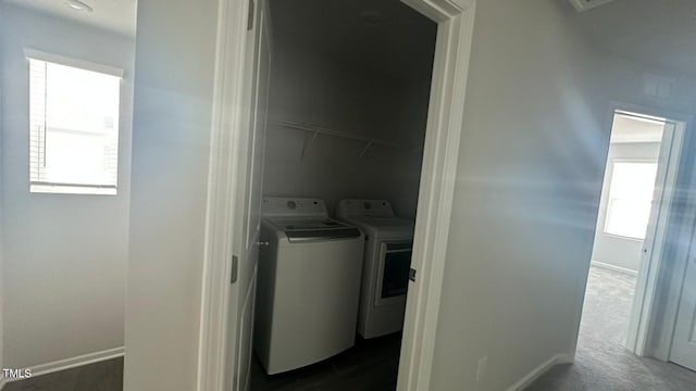 3112 Star Gazing Ln, Durham, NC 27703 - laundry room with washer and clothes dryer and baseboards
