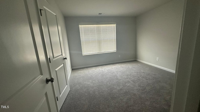 3112 Star Gazing Ln, Durham, NC 27703 - carpeted empty room featuring baseboards