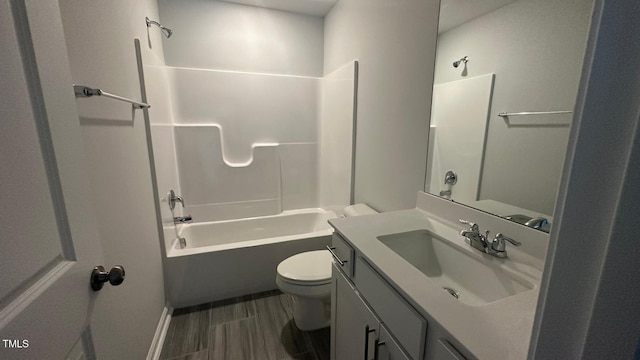 3112 Star Gazing Ln, Durham, NC 27703 - bathroom featuring toilet, bathtub / shower combination, vanity, wood finished floors, and baseboards