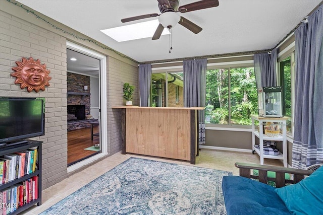 sunroom / solarium featuring a skylight