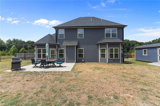 2677 Cypress Lakes Rd, Hope Mills, NC 28348 - back of house featuring a patio area and roof with shingles
