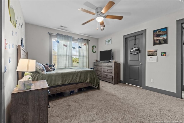 2677 Cypress Lakes Rd, Hope Mills, NC 28348 - bedroom featuring carpet floors, a ceiling fan, and baseboards