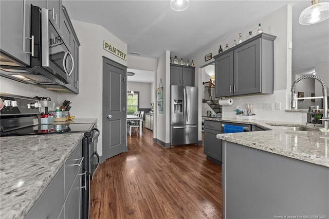 2677 Cypress Lakes Rd, Hope Mills, NC 28348 - kitchen with appliances with stainless steel finishes, a sink, gray cabinets, and dark wood finished floors