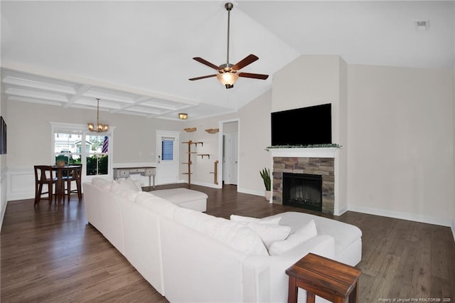 living room featuring a chandelier, ceiling fan, wood finished floors, a fireplace, and beamed ceiling