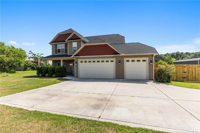 craftsman house featuring an attached garage and concrete driveway