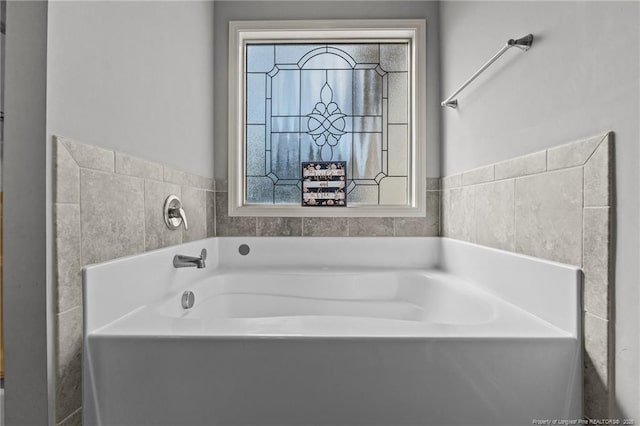 full bathroom with a garden tub
