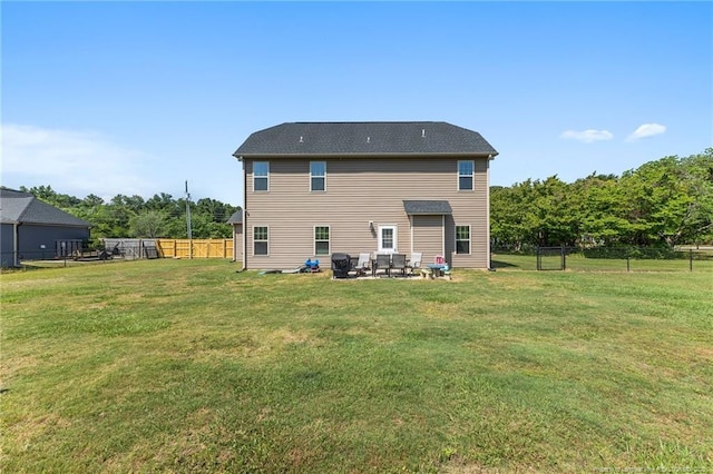 rear view of house with a patio area