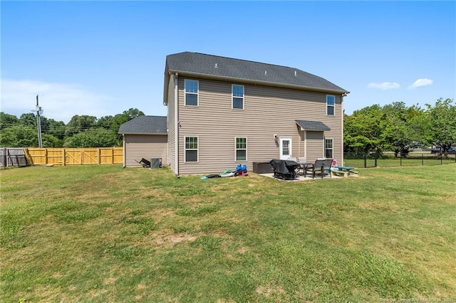rear view of house with a patio
