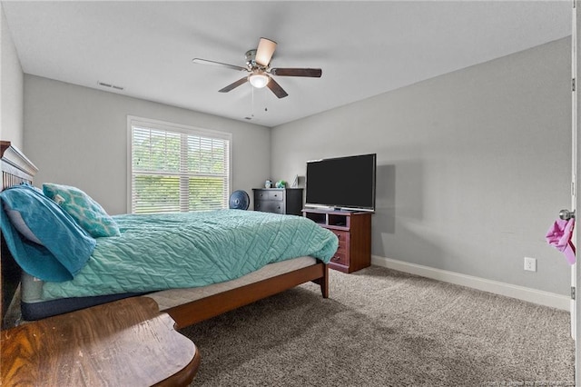 2671 Cypress Lakes Rd, Hope Mills, NC 28348 - carpeted bedroom with baseboards and ceiling fan