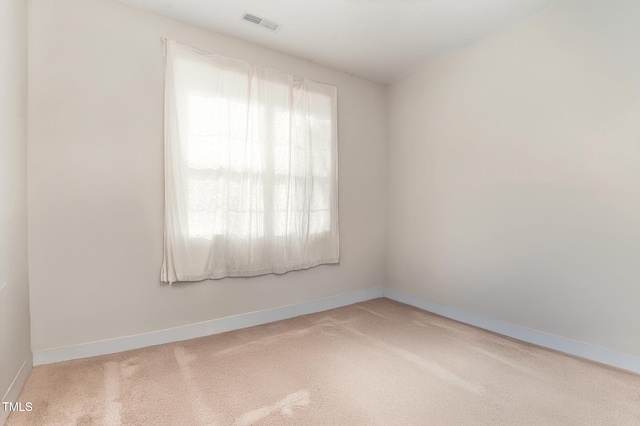 303 Godwin St, Selma, NC 27576 - carpeted spare room with baseboards