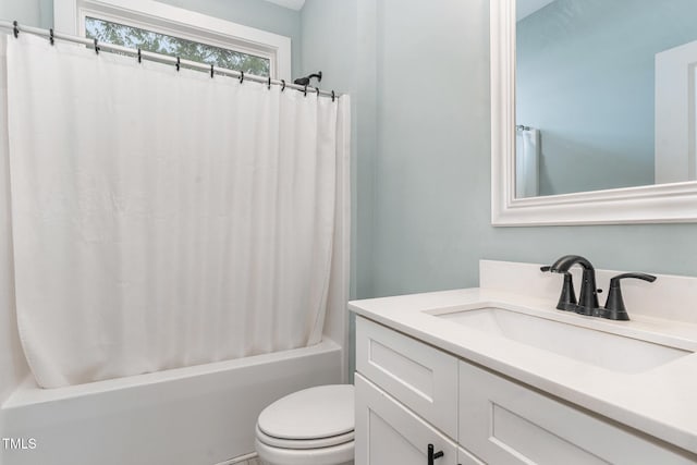 303 Godwin St, Selma, NC 27576 - bathroom featuring shower / tub combo, toilet, and vanity