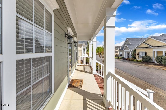balcony with a porch and a residential view