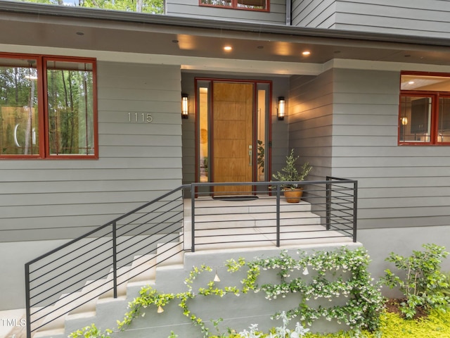 1115 Trailwood Dr, Raleigh, NC 27606 - doorway to property with a porch