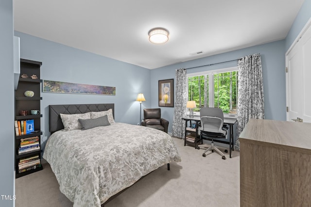 1115 Trailwood Dr, Raleigh, NC 27606 - carpeted bedroom with a desk