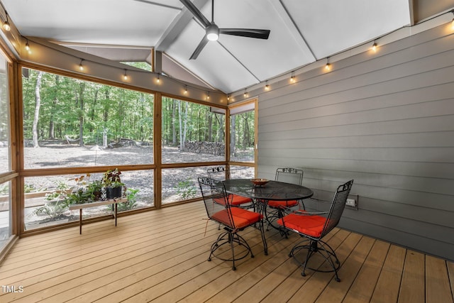 1115 Trailwood Dr, Raleigh, NC 27606 - sunroom with ceiling fan, hardwood / wood-style flooring, outdoor dining space, a wooden deck, and wooden walls