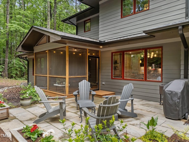 1115 Trailwood Dr, Raleigh, NC 27606 - view of patio / terrace featuring area for grilling and a sunroom