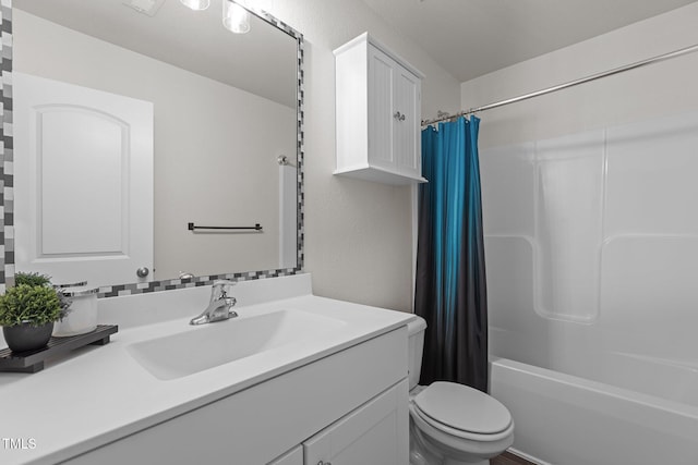 bathroom with toilet, vanity, and shower / bathtub combination with curtain