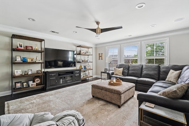 living area featuring baseboards, a ceiling fan, crown molding, wood finished floors, and recessed lighting