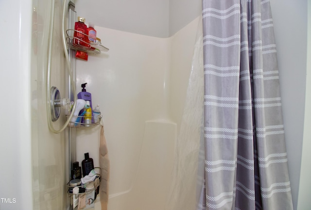 full bath with a shower with curtain
