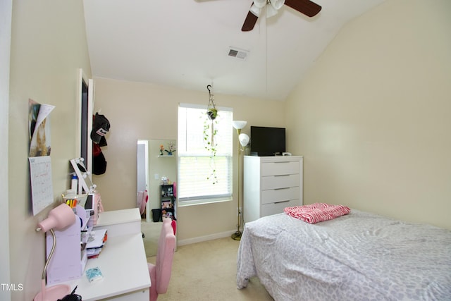 carpeted bedroom with lofted ceiling, baseboards, and a ceiling fan