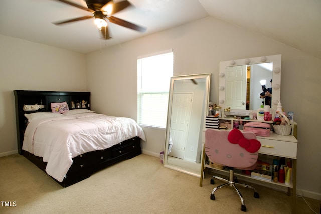 bedroom with lofted ceiling, carpet floors, ceiling fan, and baseboards