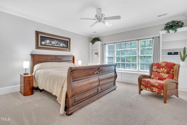 bedroom with light carpet, crown molding, and ceiling fan