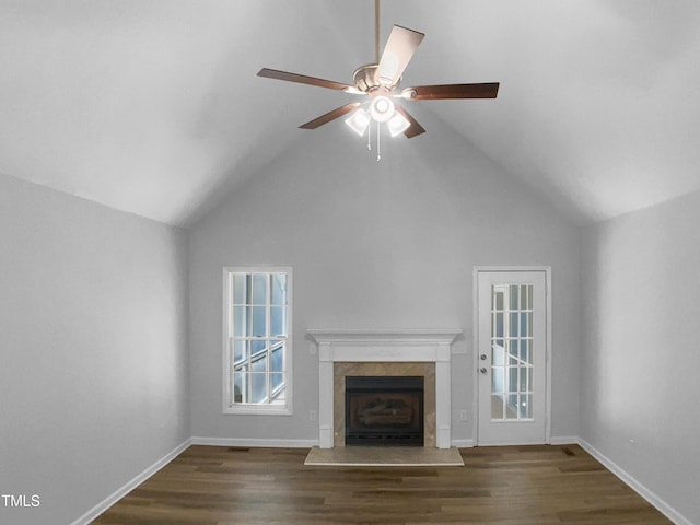 2747 Michelle Ct, Creedmoor, NC 27522 - unfurnished living room featuring a high end fireplace, wood finished floors, ceiling fan, high vaulted ceiling, and baseboards