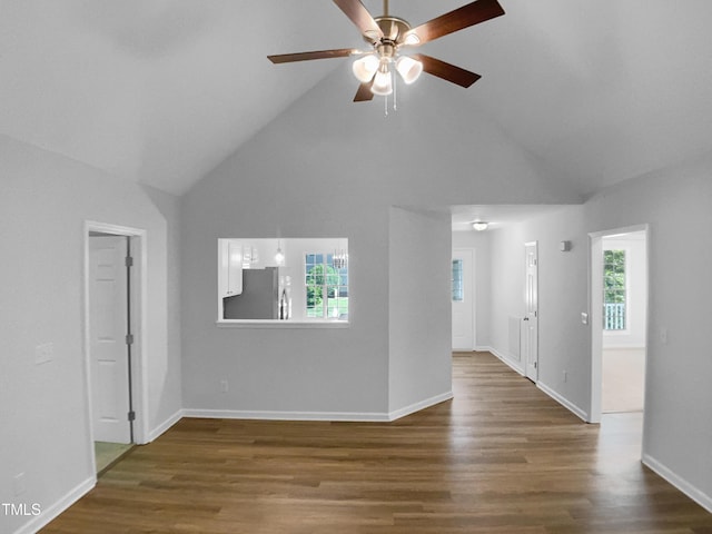 2747 Michelle Ct, Creedmoor, NC 27522 - unfurnished living room featuring high vaulted ceiling, ceiling fan, dark wood-type flooring, and baseboards