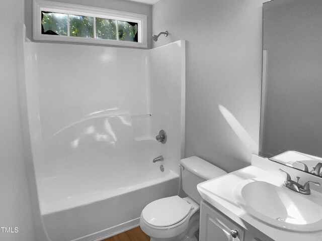 2747 Michelle Ct, Creedmoor, NC 27522 - bathroom with vanity,  shower combination, toilet, and wood finished floors