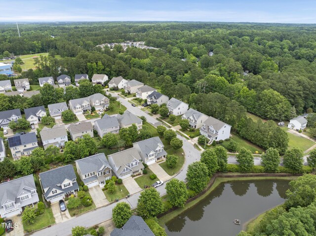 1720 Laurel Park Pl, Cary, NC 27511 - aerial view of residential area with a heavily wooded area and a nearby body of water