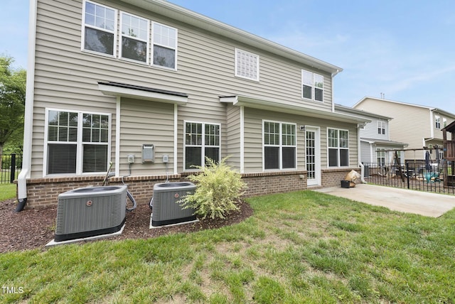 1720 Laurel Park Pl, Cary, NC 27511 - back of property featuring central AC, a patio, and brick siding