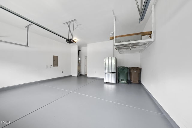 1720 Laurel Park Pl, Cary, NC 27511 - garage with a garage door opener, baseboards, and electric panel