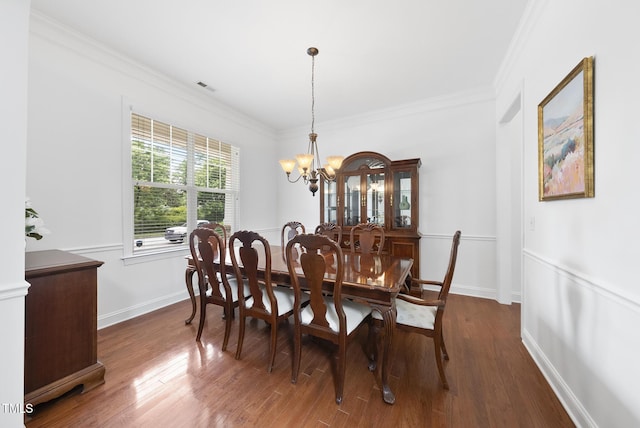 1720 Laurel Park Pl, Cary, NC 27511 - dining room featuring a chandelier, crown molding, wood finished floors, and baseboards