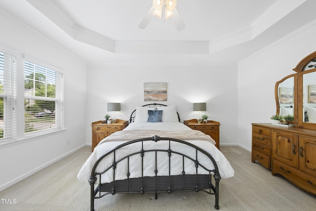 1720 Laurel Park Pl, Cary, NC 27511 - bedroom with a raised ceiling, light carpet, ornamental molding, baseboards, and ceiling fan