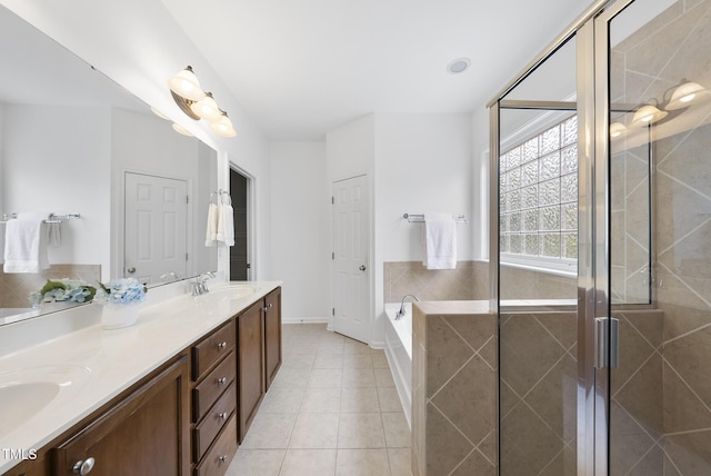 1720 Laurel Park Pl, Cary, NC 27511 - full bath featuring double vanity, tile patterned flooring, a garden tub, baseboards, and a stall shower