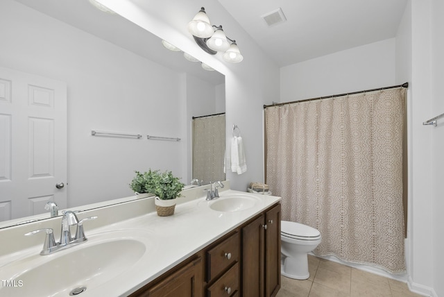 1720 Laurel Park Pl, Cary, NC 27511 - full bath featuring toilet, tile patterned floors, and double vanity
